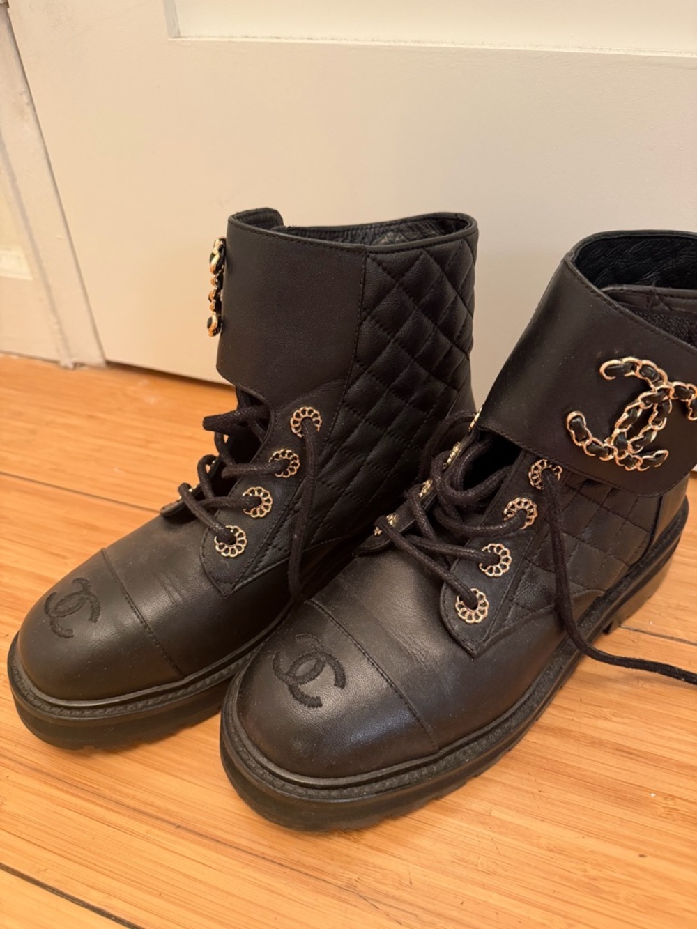 CHANEL Black Leather Quilted Ankle Boots with Gold Chain Accents - Picture 4 of 7